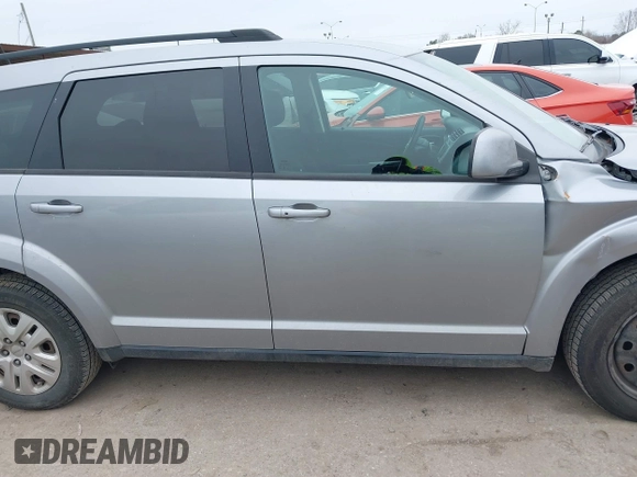 2019 Dodge Journey SE with VIN 3C4PDCBB0KT816103, listed as a IAAI auction lot 41640272 with 118,310 mi miles and . Bid and sale history available at DreamBid. Image 13.