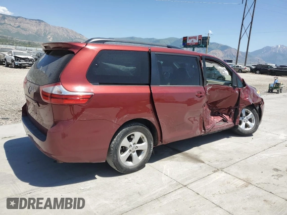 2015 Toyota Sienna LE AAS with VIN 5TDKK3DC2FS604910, listed as a Copart auction lot 59231605 with 118,974 mi miles and Salvage title. Bid and sale history available at DreamBid. Image 3.