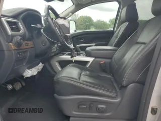 2020 Nissan Titan SL z VIN 1N6AA1ED1LN505973, wystawiony jako Copart lot #58721985 z przebiegiem 103 245 mil mil oraz Tytuł czysty. Historia ofert i sprzedaży dostępna na DreamBid. Obrazek 7.