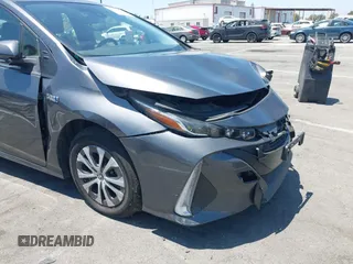2021 Toyota Prius LE with VIN JTDKAMFPXM3170372, listed as a IAAI auction lot 42661609 with 47,977 mi miles and . Bid and sale history available at DreamBid. Image 17.
