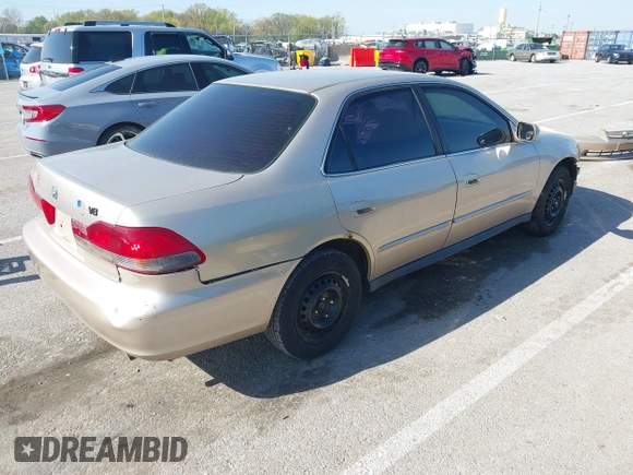 2002 Honda Accord LX with VIN 3HGCG56412G702456, listed as a IAAI auction lot 42040650 with 203,310 mi miles and . Bid and sale history available at DreamBid. Image 4.