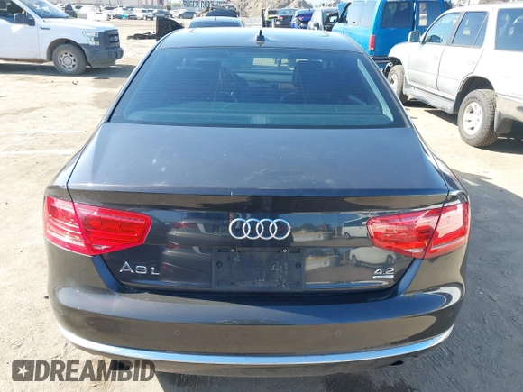 2011 Audi A8 with VIN WAURVAFD9BN014362, listed as a IAAI auction lot 41960366 with 135,244 mi miles and . Bid and sale history available at DreamBid. Image 16.