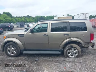 2007 Dodge Nitro SLT z VIN 1D8GT58K07W735904, wystawiony jako IAAI lot #42216665 z przebiegiem 168 000 mil mil oraz . Historia ofert i sprzedaży dostępna na DreamBid. Obrazek 14.