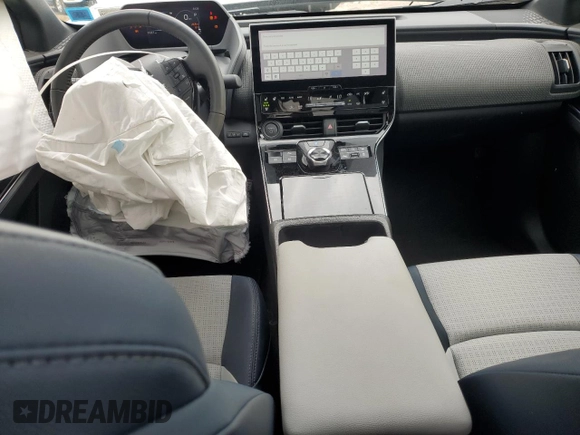 2023 Subaru Solterra Touring with VIN JTMABABA4PA003434, listed as a Copart auction lot 59837165 with 9,587 mi miles and Salvage title. Bid and sale history available at DreamBid. Image 8.