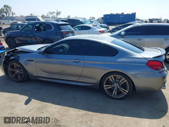 2013 BMW M6 with VIN WBSLX9C51DC968593, listed as a IAAI auction lot 42465979 with 88,010 mi miles and . Bid and sale history available at DreamBid. Image 14.