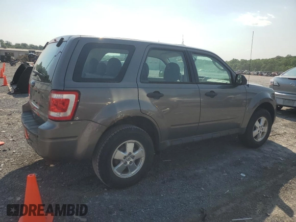 2012 Ford Escape XLS with VIN 1FMCU0C78CKA70652, listed as a Copart auction lot 60624215 with 203,220 mi miles and Clean title. Bid and sale history available at DreamBid. Image 3.
