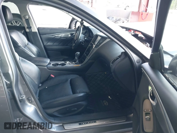2015 Infiniti Q50 Premium z VIN JN1BV7AR3FM422042, wystawiony jako IAAI lot #42258784 z przebiegiem 72 030 mil mil oraz . Historia ofert i sprzedaży dostępna na DreamBid. Obrazek 5.