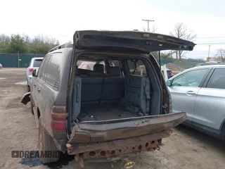 2000 Toyota Land Cruiser with VIN JT3HT05J9Y0091796, listed as a IAAI auction lot 41499612 with 0 mi miles. Bid and sale history available at carsss.com. Image 3.