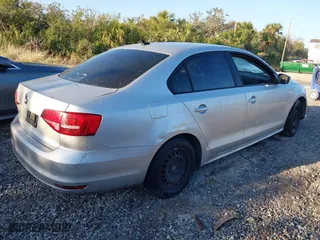 2015 Volkswagen Jetta Sedan 2.0L S w/Technology with VIN 3VW2K7AJXFM274585, listed as a IAAI auction lot 41482902 with 1 mi miles. Bid and sale history available at carsss.com. Image 4.