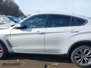2019 BMW X6 xDrive35i with VIN 5UXKU2C57K0Z63351, listed as a IAAI auction lot 41637597 with 91,121 mi miles. Bid and sale history available at carsss.com. Image 14.