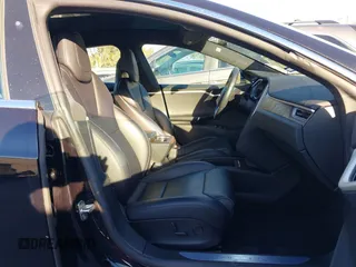 2017 Tesla Model S 60 with VIN 5YJSA1E19HF226094, listed as a IAAI auction lot 40931307 with 80,392 mi miles and . Bid and sale history available at DreamBid. Image 5.