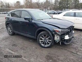 2019 Mazda CX-5 Signature with VIN JM3KFBEY4K0525171, listed as a IAAI auction lot 41706635 with 88,293 mi miles. Bid and sale history available at carsss.com. Image 1.