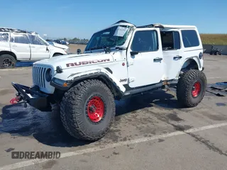 2018 Jeep Wrangler Unlimited Rubicon with VIN 1C4HJXFGXJW110629, listed as a IAAI auction lot 42141572 with 65,973 mi miles and . Bid and sale history available at DreamBid. Image 2.