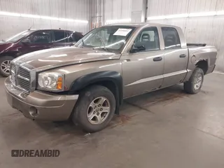 2006 Dodge Dakota SLT with VIN 1D7HE48K36S635377, listed as a IAAI auction lot 42200803 with 156,812 mi miles and . Bid and sale history available at carsss.com. Image 2.