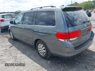 2010 Honda Odyssey EX-L with VIN 5FNRL3H76AB010388, listed as a IAAI auction lot 41963396 with 197,835 mi miles. Bid and sale history available at carsss.com. Image 3.