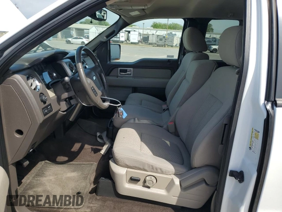 2010 Ford F-150 XL with VIN 1FTFX1CV6AFD04872, listed as a Copart auction lot 53156965 with 194,970 mi miles and Salvage Title. Bid and sale history available at carsss.com. Image 7.