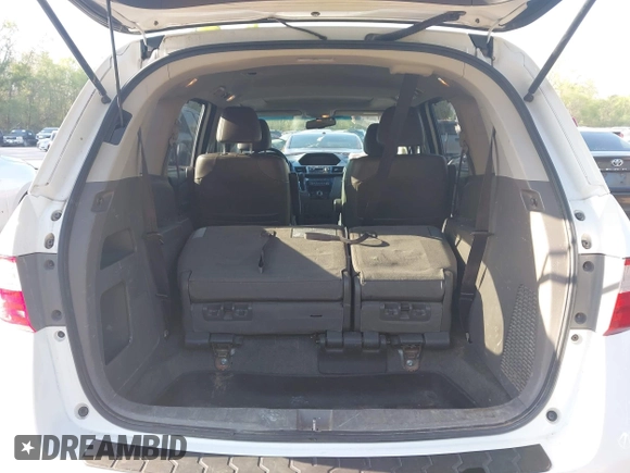 2012 Honda Odyssey EX-L with VIN 5FNRL5H62CB010054, listed as a IAAI auction lot 42040117 with 189,566 mi miles and . Bid and sale history available at carsss.com. Image 19.