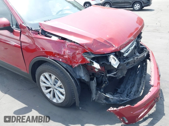 2018 Volkswagen Tiguan S with VIN 3VV1B7AX3JM128705, listed as a IAAI auction lot 42110808 with 60,589 mi miles and . Bid and sale history available at DreamBid. Image 17.