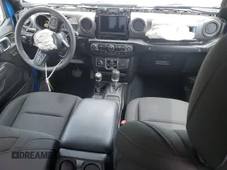 2023 Jeep Gladiator Sport S with VIN 1C6HJTAG3PL593284, listed as a Copart auction lot 57292935 with Not provided miles and Salvage title. Bid and sale history available at DreamBid. Image 8.
