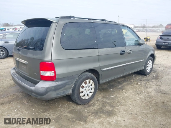 2004 Kia Sedona LX with VIN KNDUP131546543841, listed as a IAAI auction lot 41541012 with 112,122 mi miles. Bid and sale history available at carsss.com. Image 4.