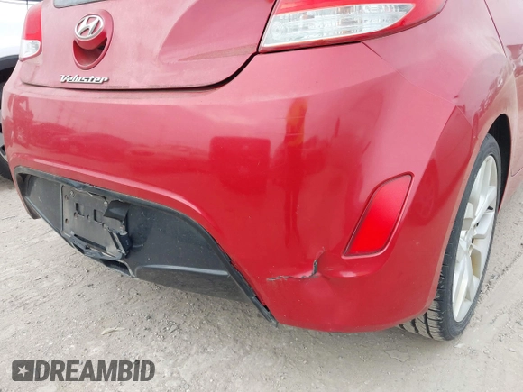 2013 Hyundai Veloster w/Gray Int with VIN KMHTC6AD2DU141462, listed as a IAAI auction lot 42136445 with 122,146 mi miles and . Bid and sale history available at DreamBid. Image 6.