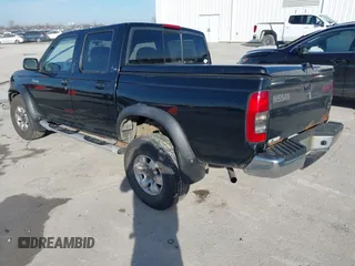 2000 Nissan Frontier XE z VIN 1N6ED27Y7YC341338, wystawiony jako IAAI lot #41486231 z przebiegiem 311 040 mil mil oraz . Historia ofert i sprzedaży dostępna na DreamBid. Obrazek 3.