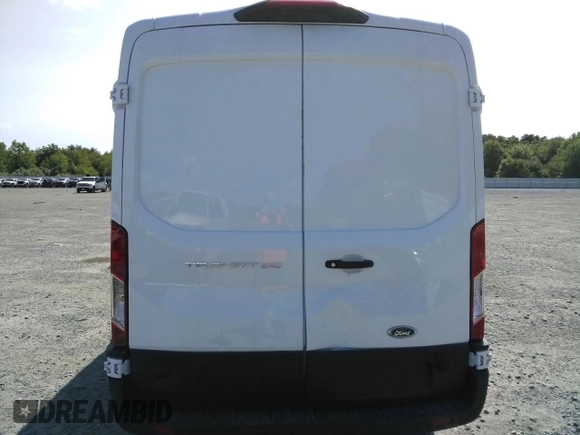 2023 Ford Transit Cargo with VIN 1FTBR1C87PKC01057, listed as a Copart auction lot 66183374 with 1,863 mi miles and Salvage Title. Bid and sale history available at DreamBid. Image 6.