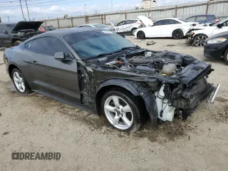 2017 Ford Mustang V6 with VIN 1FA6P8AM6H5287032, listed as a Copart auction lot 50973275 with 98,477 mi miles and Salvage Title. Bid and sale history available at carsss.com. Image 4.