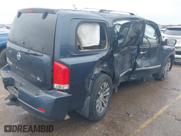 2015 Nissan Armada SV z VIN 5N1BA0ND7FN612818, wystawiony jako IAAI lot #41459324 z przebiegiem 100 326 mil mil oraz . Historia ofert i sprzedaży dostępna na DreamBid. Obrazek 4.