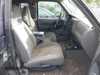 2001 Ford Ranger XL Fleet z VIN 1FTZR15E21TA14005, wystawiony jako IAAI lot #42212472 z przebiegiem 145 933 mil mil oraz . Historia ofert i sprzedaży dostępna na DreamBid. Obrazek 5.