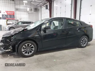 2022 Toyota Prius L Eco with VIN JTDKAMFU2N3186072, listed as a IAAI auction lot 42486252 with 5,887 mi miles and . Bid and sale history available at DreamBid. Image 14.