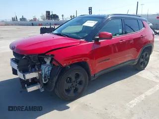 2021 Jeep Compass Altitude with VIN 3C4NJCBB3MT560039, listed as a IAAI auction lot 42536979 with 30,357 mi miles and . Bid and sale history available at DreamBid. Image 2.