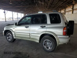 1999 Suzuki Grand Vitara LX z VIN JS3TD62V3X4123048, wystawiony jako Copart lot #73007124 z przebiegiem 159 828 mil mil oraz Szkoda całkowita • Salvage title. Historia ofert i sprzedaży dostępna na DreamBid. Obrazek 2.
