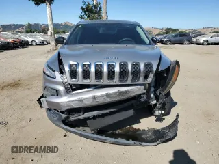 2015 Jeep Cherokee Sport with VIN 1C4PJLAB7FW762115, listed as a Copart auction lot 61613335 with 150,650 mi miles and Salvage title. Bid and sale history available at DreamBid. Image 5.