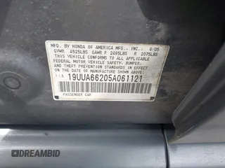 2005 Acura TL with VIN 19UUA66205A061121, listed as a IAAI auction lot 42054185 with 165,097 mi miles. Bid and sale history available at carsss.com. Image 9.