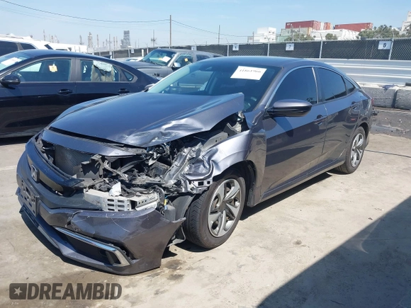 2020 Honda Civic LX with VIN 2HGFC2F67LH551651, listed as a IAAI auction lot 41861966 with 205,619 mi miles and . Bid and sale history available at DreamBid. Image 17.