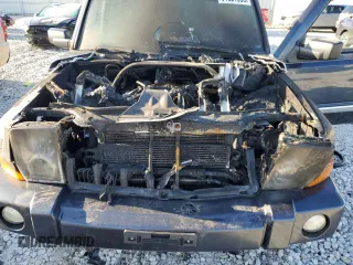 2010 Jeep Commander Sport с VIN 1J4RG4GK0AC124393, выставлен на аукционе Copart как лот 51321935 с пробегом Не указан миль и На запчасти • Non repairable. История ставок и продаж доступна на DreamBid. Изображение 13.