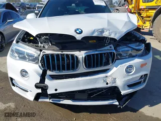 2018 BMW X5 xDrive40e iPerformance with VIN 5UXKT0C53J0W00910, listed as a IAAI auction lot 41842046 with 48,838 mi miles. Bid and sale history available at carsss.com. Image 6.