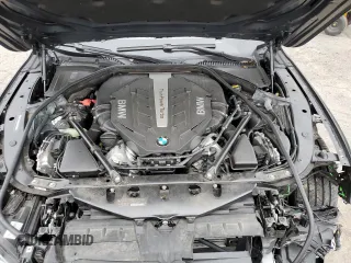 2015 BMW 7 Series 750Li xDrive z VIN WBAYF8C54FD654795, wystawiony jako Copart lot #82381894 z przebiegiem 56 968 mil mil oraz Szkoda całkowita • Salvage title. Historia ofert i sprzedaży dostępna na DreamBid. Obrazek 11.