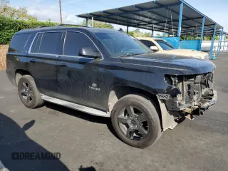 2015 Chevrolet Tahoe LT with VIN 1GNSCBKC0FR727525, listed as a Copart auction lot 53171665 with 114,689 mi miles and Salvage title. Bid and sale history available at DreamBid. Image 4.