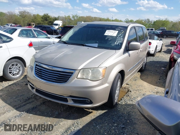 2013 Chrysler Town & Country Touring with VIN 2C4RC1BG8DR559824, listed as a IAAI auction lot 41818237 with 211,248 mi miles. Bid and sale history available at carsss.com. Image 2.
