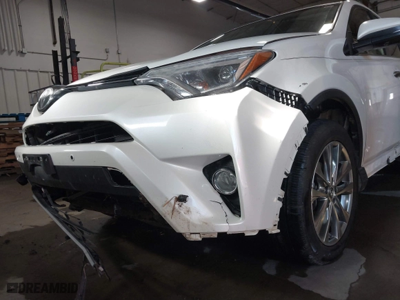 2018 Toyota RAV4 Limited with VIN JTMDFREV8JD235765, listed as a IAAI auction lot 41312430 with 205,732 mi miles. Bid and sale history available at carsss.com. Image 6.