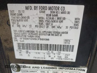 2012 Ford F-150 XL with VIN 1FTEW1CM5CFB80098, listed as a IAAI auction lot 42098438 with 216,694 mi miles. Bid and sale history available at carsss.com. Image 9.