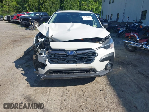 2024 Subaru Crosstrek Premium z VIN JF2GUADC0R8873664, wystawiony jako IAAI lot #42395857 z przebiegiem 11 924 mil mil oraz . Historia ofert i sprzedaży dostępna na DreamBid. Obrazek 12.