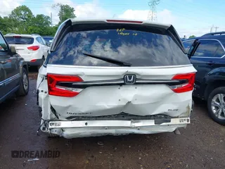 2022 Honda Odyssey Elite with VIN 5FNRL6H91NB058941, listed as a IAAI auction lot 42320293 with 30,977 mi miles and . Bid and sale history available at DreamBid. Image 6.