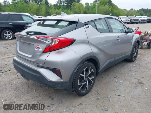 2018 Toyota C-HR XLE with VIN NMTKHMBX7JR014817, listed as a IAAI auction lot 42254183 with 128,561 mi miles and . Bid and sale history available at DreamBid. Image 4.