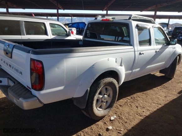 2003 Nissan Frontier 4WD SVE with VIN 1N6MD29Y93C451874, listed as a IAAI auction lot 41470198 with 216,482 mi miles. Bid and sale history available at carsss.com. Image 4.