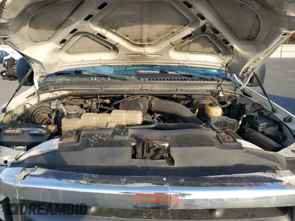 2003 Ford F-250 XL z VIN 1FTNF21L83ED10378, wystawiony jako Copart lot #78414894 z przebiegiem 158 936 mil mil oraz Szkoda całkowita • Salvage title. Historia ofert i sprzedaży dostępna na DreamBid. Obrazek 11.