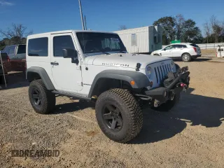 2013 Jeep Wrangler Rubicon with VIN 1C4BJWCG3DL590006, listed as a Copart auction lot 85855594 with 99,218 mi miles and Salvage title. Bid and sale history available at DreamBid. Image 4.