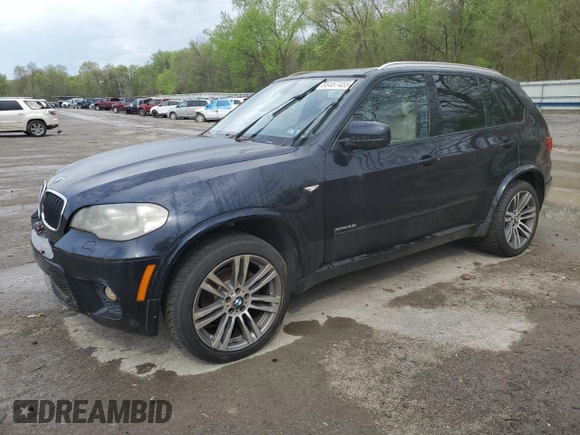 2012 BMW X5 35i z VIN 5UXZV4C5XCL748652, wystawiony jako Copart lot #55457455 z przebiegiem 149 030 mil mil oraz Szkoda całkowita • Salvage title. Historia ofert i sprzedaży dostępna na DreamBid. Obrazek 1.